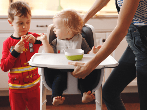 Toddler in 4moms Connect High Chair®